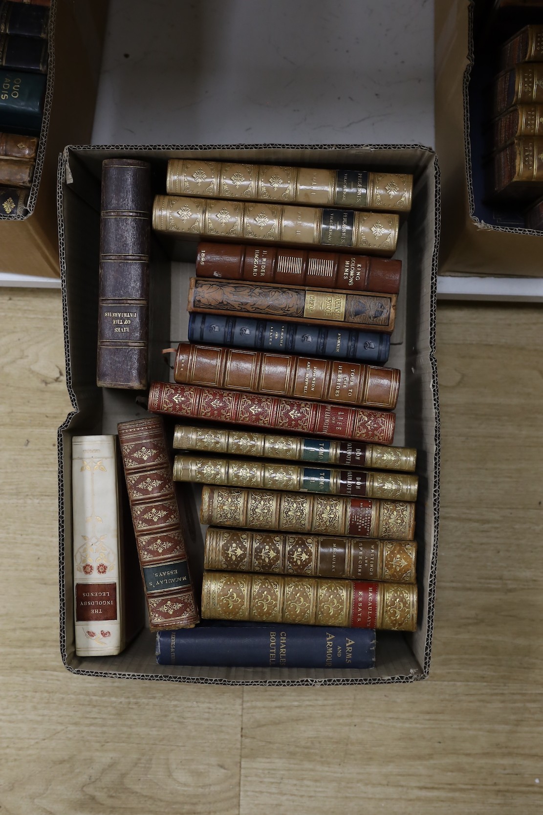 A large quantity of leather bound books including Tracts For The Times, Caroline of Anspach by W.H. Wilkins, Don Quixote, Lives of The Engineers Smile, Pendennis etc.